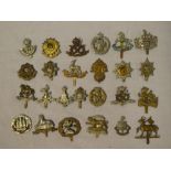 Twenty-five original Infantry cap badges including York & Lancaster Regt.