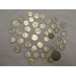 A selection of pre-1947 silver coins including 1899 half crown, 1928 half crown,