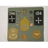 A card of United States Air Service First War badges and insignia including officer's cap badge,