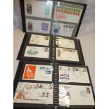 Three folder albums containing 140 GB first day covers 1964-1987