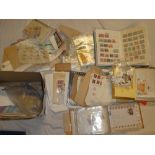 A box containing a large selection of World stamps in packets, stockbook of Commonwealth stamps,