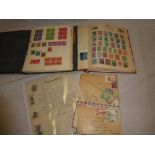 Two albums containing a selection of World stamps, various postal covers,