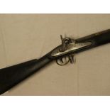 An 1814 East India pattern percussion musket with 33" barrel, plain steel lock,