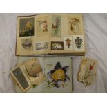 A Victorian album of greetings cards and scraps and an album of various watercolour sketches,