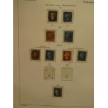 A folder album containing a comprehensive selection of GB stamps 1840 onwards including 1d black,