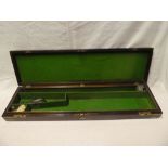 A 19th Century brass mounted mahogany gun case with inset lift-out handle,