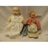 Child's old porcelain headed doll by Armand Marseille and one other composition doll (2)