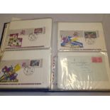 A folder album containing a collection of over 90 World first day covers 1937-1971 including Queen