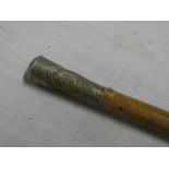 A Cadet's swagger stick with nickel plated top bearing the badge for the Truro Cathedral School