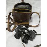 A pair of First War 8x24 binoculars by Goerz of Berlin in leather carrying case marked "B.