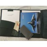 A Concorde passenger folder with booklet, baggage tags,