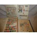 Three stockbooks containing a selection of World stamps,