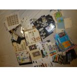 A box containing various packets of World stamps, stock cards of stamps,