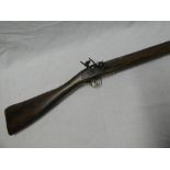 A 19th Century 8-bore flintlock long barrel bank gun with 61" steel barrel,