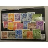 A Seychelles 1954-61 complete definitive set of stamps,