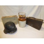 A relic First War German helmet, relic German ammunition box,