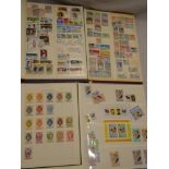 Four stockbooks/albums containing a selection of mixed World stamps including a stockbook of