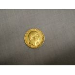 An Edward V11 1906 gold half sovereign (vf/ef)