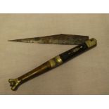 An old Spanish folding lock knife with 7" single-edged blade and horn mounted grips