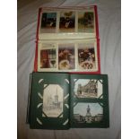 An album of various postcards 1902 - 1920's and an album of mainly First War greetings postcards