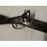 An early 19th Century flintlock musket with 39" steel barrel, plain steel lock,