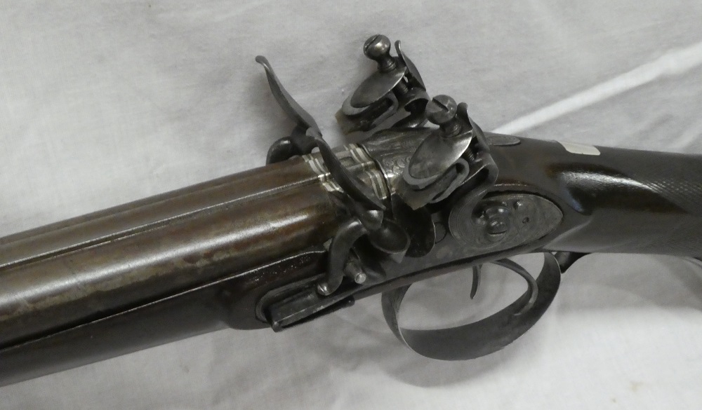 An early 19th Century 16 bore flintlock double barrel sporting gun by Joseph Gully of London with