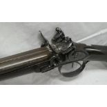 An early 19th Century 16 bore flintlock double barrel sporting gun by Joseph Gully of London with