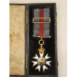 A rare pre 1887 18ct gold and enamel Order of St Michael and St George with original ribbon and