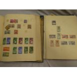 Two folder albums containing British Commonwealth stamps,