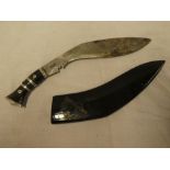A post war Gurkha kukri with curved single edged blade marked "Military Supply Syndicate" with