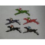 Five painted metal racehorse game figures
