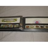 An album containing 40 GB presentation stamp packs 1969-1986