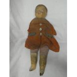 A childs old doll with papier mache head and cloth body 20" long (af)