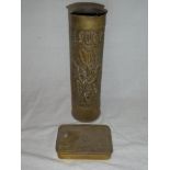 A First War brass cannon shell with embossed decoration "Alsace" and an original brass 1914