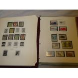 Two folder albums containing a collection of Australia stamps