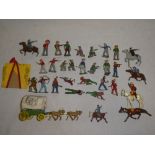 A metal Western covered wagon and horses and a selection of metal Cowboy and Indian figures etc