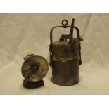 An miners acetylene open flame lamp with iron mounts and a small brass mounted Premier cap lamp (2)