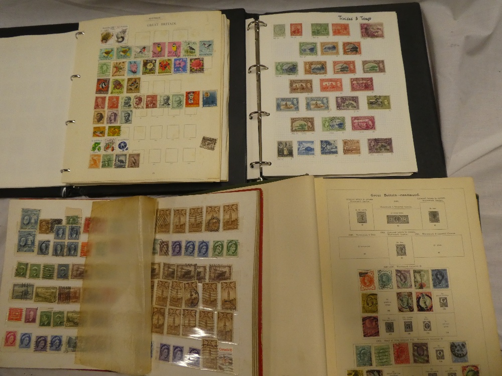 Four albums/stock books containing a selection of British Commonwealth stamps