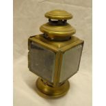 An old brass motoring oil lamp by Radmore of Birmingham 10 1/2" high (af)
