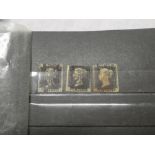 A stock book containing a selection of mainly Victorian GB stamps including three 1d Blacks,