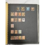 A folder album containing a collection of GB stamps 1840-1981 including 1d black, 2d blue,