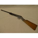 A 1930's/40's Diana Model 15 tin-plate air rifle with wooden stock (spring replaced)