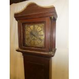 An early to mid 18th Century longcase clock by Wolley of Codnor (Woolley) with 10" brass square