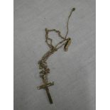 A 9ct gold crucifix pendant with 9ct chain