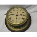 An old ships bulkhead wall clock by Smiths with circular dial,