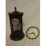 An Edwardian brass mounted mahogany four-pillar mantel clock with silvered circular dial (minus