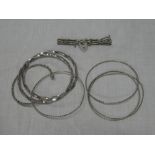 A selection of various silver bangles, silver gate link bracelet,