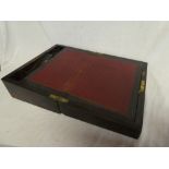 A Victorian rosewood rectangular writing slope with fitted interior
