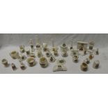 A selection of approximately thirty-five various china crested souvenir pieces including Nurse