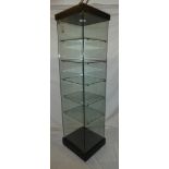 A good quality glass freestanding mobile square section display cabinet with shelves,